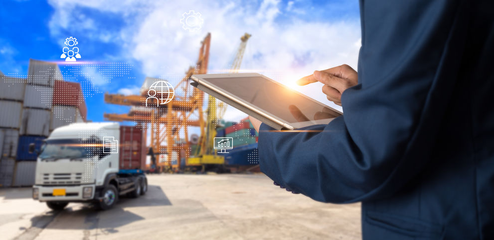 Business Logistics concept, Businessman manager using tablet check and control for workers with Modern Trade warehouse logistics. Industry 4.0 concept